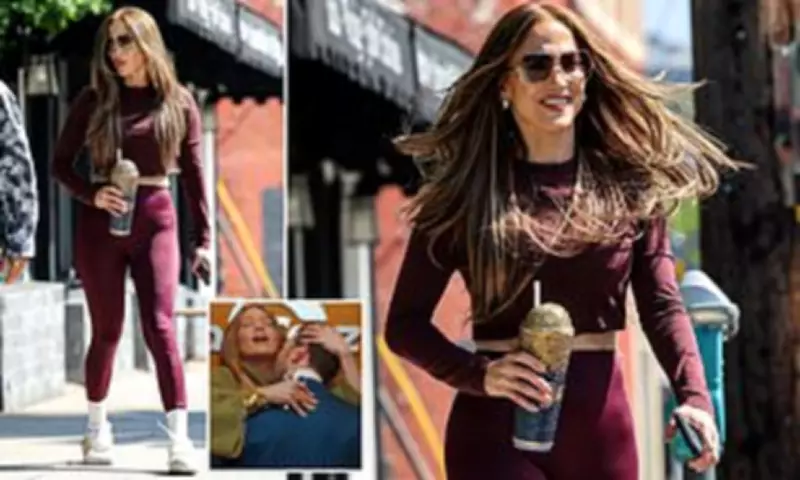 Jennifer Lopez, 56, Flashes Toned Abs in Maroon Workout Gear in LA