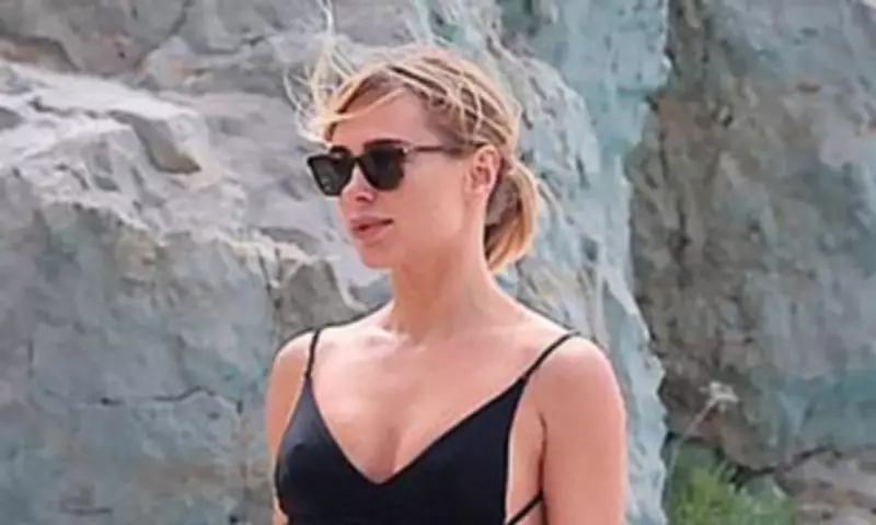 Kimberley Garner Stuns in Black Swimsuit at Cannes Film Festival