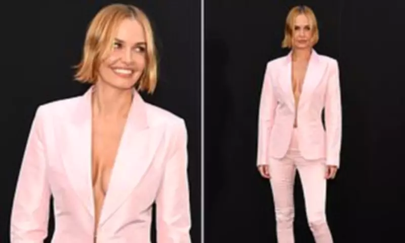 Lara Worthington Goes Braless in Pink Blazer at Gucci Cruise 2027 Show