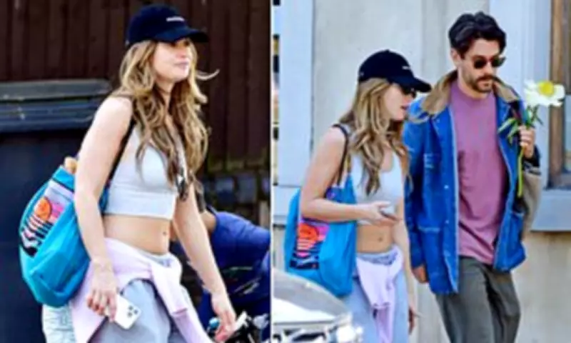 Lily James Shows Toned Midriff on Casual Stroll with Bart Edwards