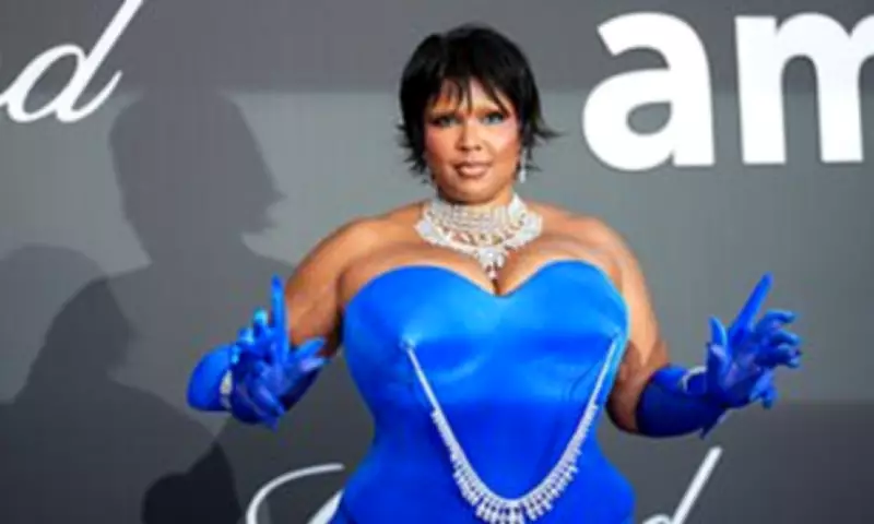 Lizzo Dazzles in Daring Blue Corset at Star-Studded amfAR Gala in Cannes