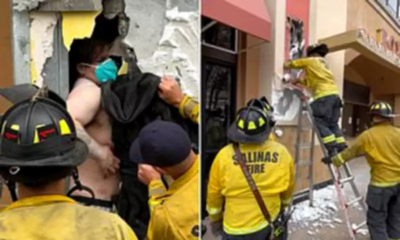 Man Arrested After Being Rescued from Movie Theater Wall in California