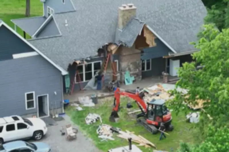 Man Uses Excavator to Demolish Home with Family Inside