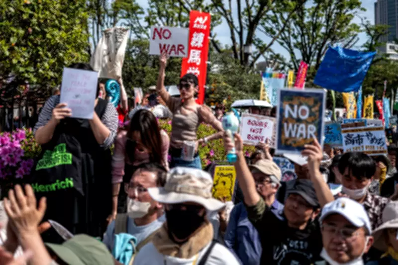 Over 50,000 Protest Japan PM's Plan to Revise Pacifist Constitution