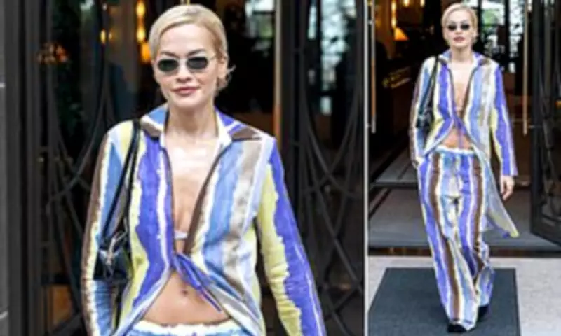 Rita Ora Shows Toned Abs in Bikini Top Leaving London Hotel