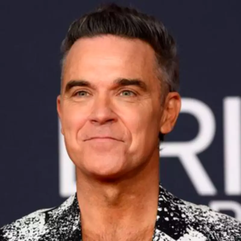 Robbie Williams Chips Tooth Brushing, Wife Ayda Compares Him to Dumb and Dumber