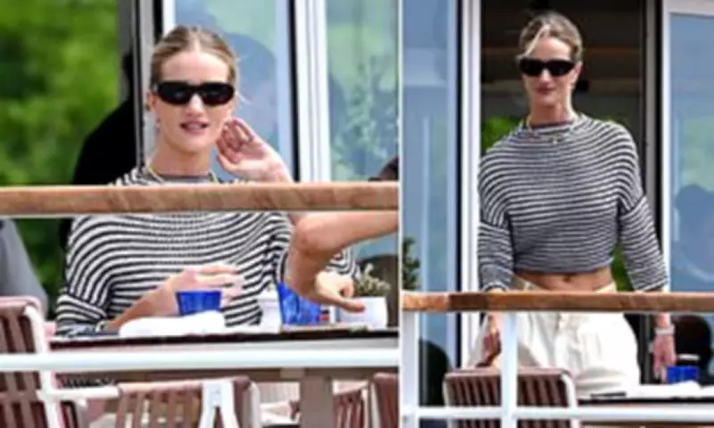 Rosie Huntington-Whiteley Shows Toned Abs at Cannes Lunch Outing