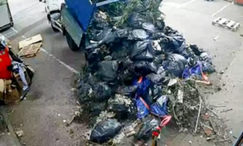 Shocking moment truck dumps waste outside shop in England's fly-tipping capital