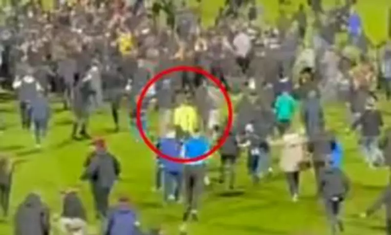 Stockport Fan Tackles Stevenage Goalkeeper During Pitch Invasion