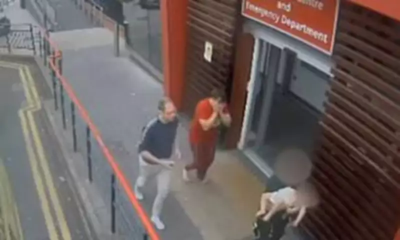Teacher accused of murdering baby boy captured on CCTV rushing him to hospital