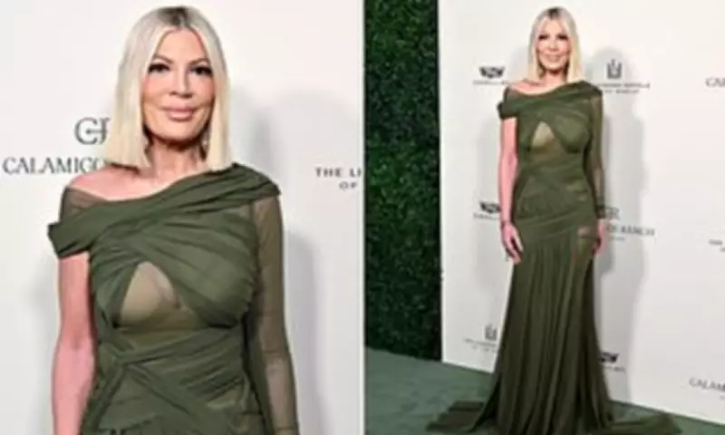 Tori Spelling Dares in Sheer Mesh Mummy Dress at Malibu Event