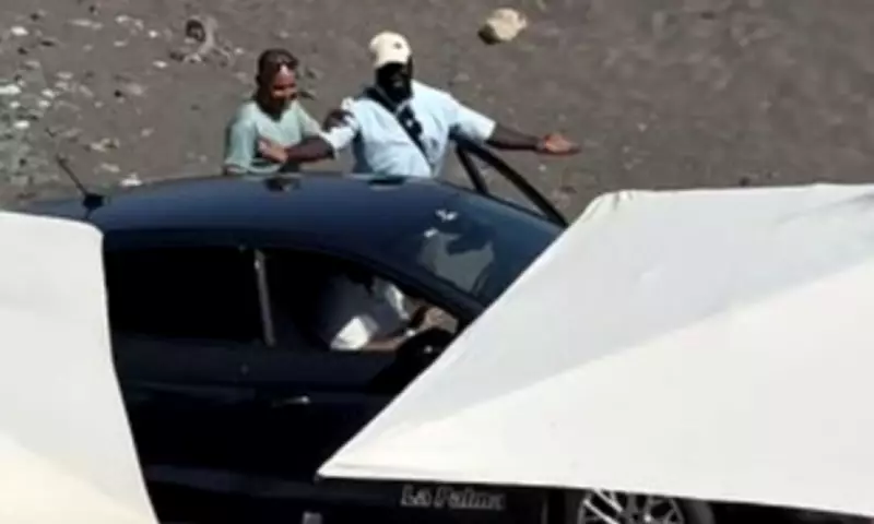 Tourist's Rental Car Gets Stuck in Sand on Busy Tenerife Beach