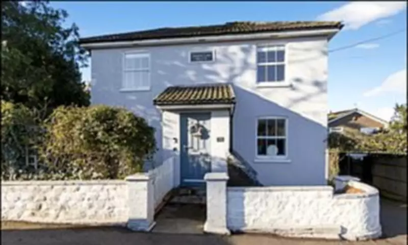 UK Housing Market Stagnates with Zero Annual Growth and Falling Prices