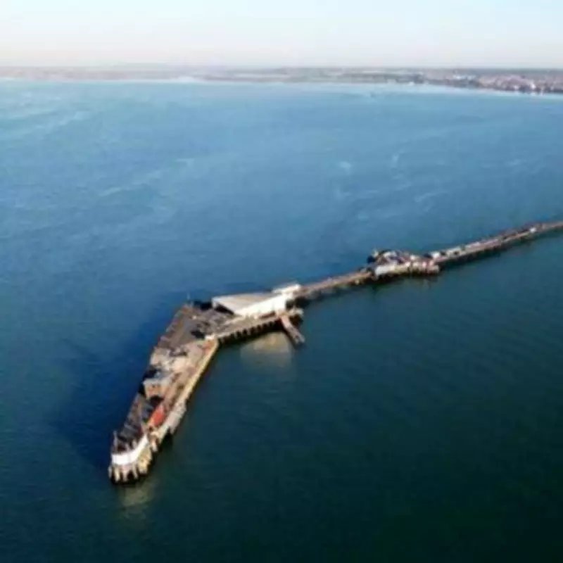 UK's Longest Pleasure Pier with Historic Train in Seaside Town