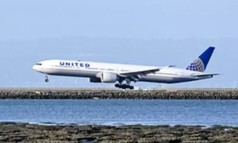 United Airlines Flight Makes Emergency Landing After Passenger Tries to Open Door