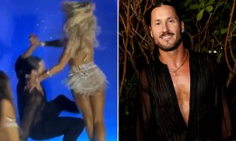 Val Chmerkovskiy and Emma Slater Slip and Fall During SI Runway Show