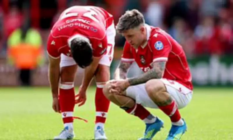 Wrexham's Premier League Dream on Hold After Final Day Heartbreak
