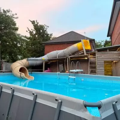 Dad Goes Viral With 12ft Pool and Waterslide in Manchester Garden