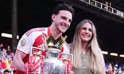 Declan Rice Celebrates Premier League Title with Family on Pitch