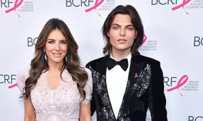 Elizabeth Hurley Stuns in Pink at Breast Cancer Research Gala with Son Damian