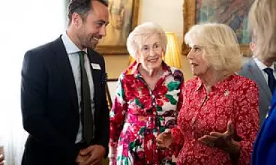 Queen Camilla and James Middleton Share Warm Embrace at Dog Charity Reception
