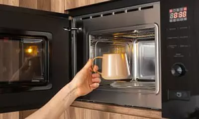 Reheating Coffee Multiple Times Can Irritate Your Stomach, Doctors Warn