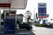 Americans Cut Spending as Gas Prices Hit Record $4.43 Amid Iran Conflict