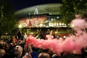 Arsenal Players Celebrate Premier League Title with Fans Outside Emirates at Dawn