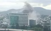 Brisbane Blaze: Person Rescued from Rooftop as Fire Engulfs Building