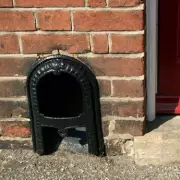 Brits Baffled by Mystery Metal Hatches Outside Homes