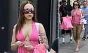 Doja Cat Turns Heads in Racy Pink Outfit for Manchester Shopping Spree