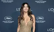Eva Longoria Stuns in Plunging Gold Gown at Cannes Gala Amid US Exit