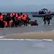 French Police Probed for Slashing Migrant Boat Near Calais