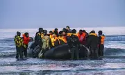 French Police Watch as Migrants Attempt Channel Crossing; Total Crossings Surpass 200,000