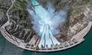 Global Photos: Dam Spillways, Eid Prayers, and Protests