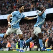 Jeremy Doku keeps Man City in title race with 3-0 win over Brentford