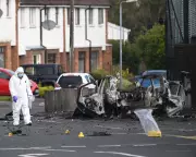 Man charged after car bomb attack on Dunmurry police station near Belfast