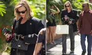 Margot Robbie Strolls NYC in Chanel, Shows Son Photo on Phone