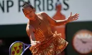 Naomi Osaka Stuns in Custom Gold Nike Dress at French Open First Round