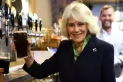 Queen Camilla Jokes About King Charles While Pulling Pint at Pub