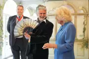 Queen Camilla Receives Coronation Portrait Fan at Fan Museum Exhibition