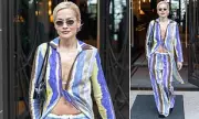 Rita Ora Shows Toned Abs in Bikini Top Leaving London Hotel