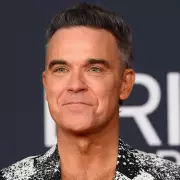 Robbie Williams Chips Tooth Brushing, Wife Ayda Compares Him to Dumb and Dumber