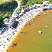 Sewage Fears Dismissed as Brown Water at Welsh Beach Caused by Harmless Algae
