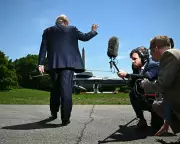 Trump Arrives in Beijing for High-Stakes Summit with Xi Amid Iran War