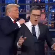 Trump Shares AI Video of Throwing Colbert in Bin in Bizarre Post