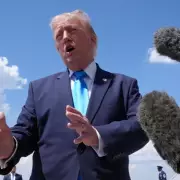 Trump's Erratic Day: Hints at Staying in Power Until 2032