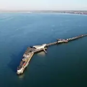 UK's Longest Pleasure Pier with Historic Train in Seaside Town
