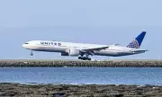 United Airlines Flight Makes Emergency Landing After Passenger Tries to Open Door