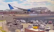 United Airlines Plane Strikes Light Pole and Truck at Newark Airport